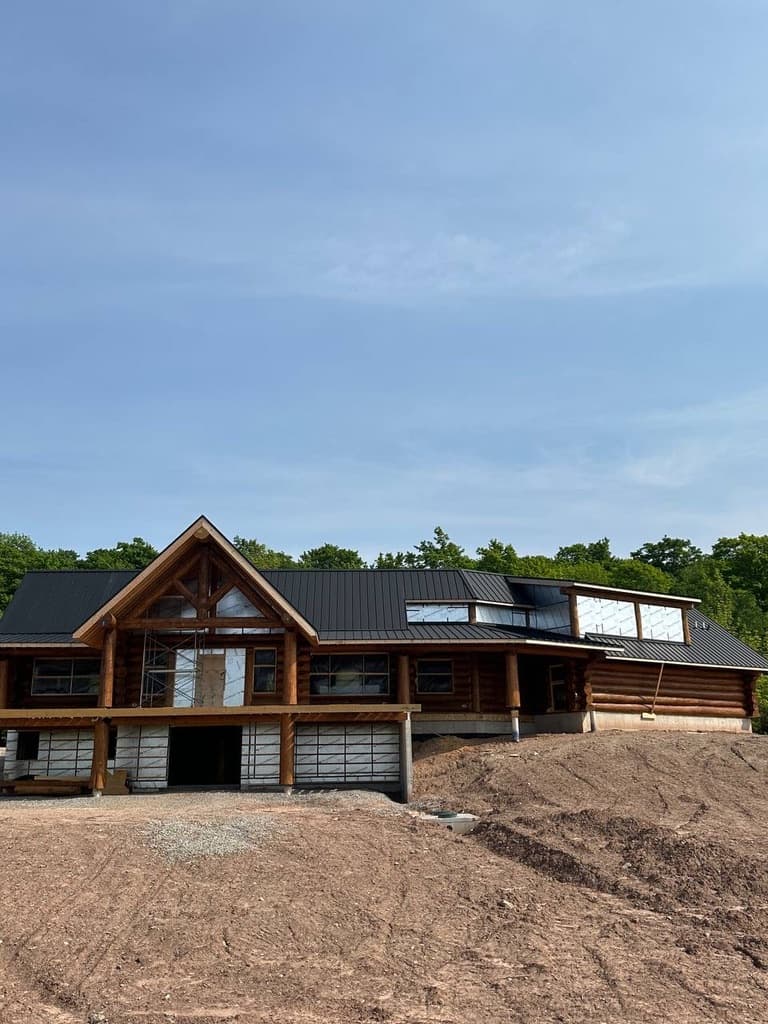 Victorian farmhouse standing seam metal roof