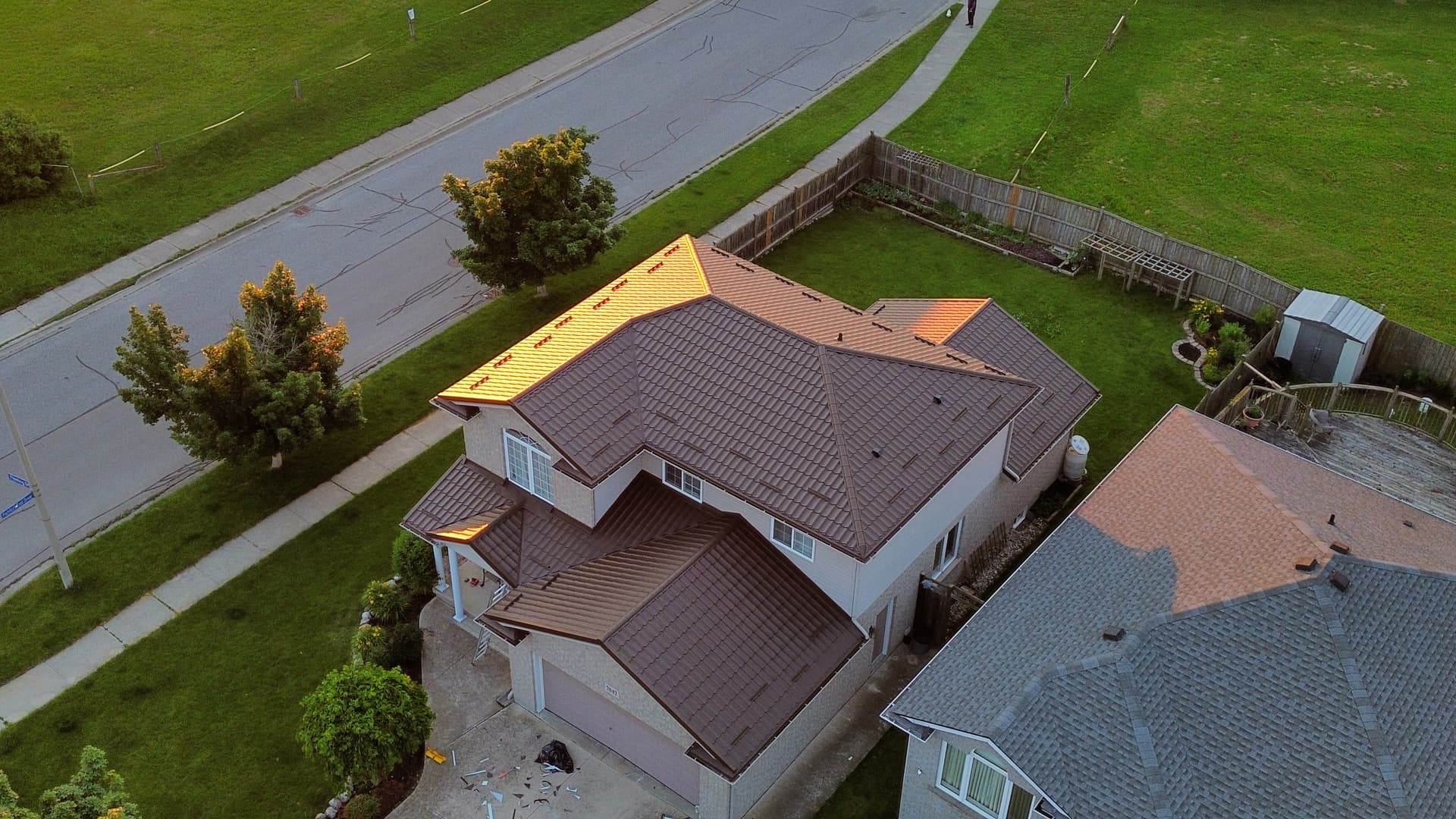 Aerial view of brown metal tile roof — VAH Construction